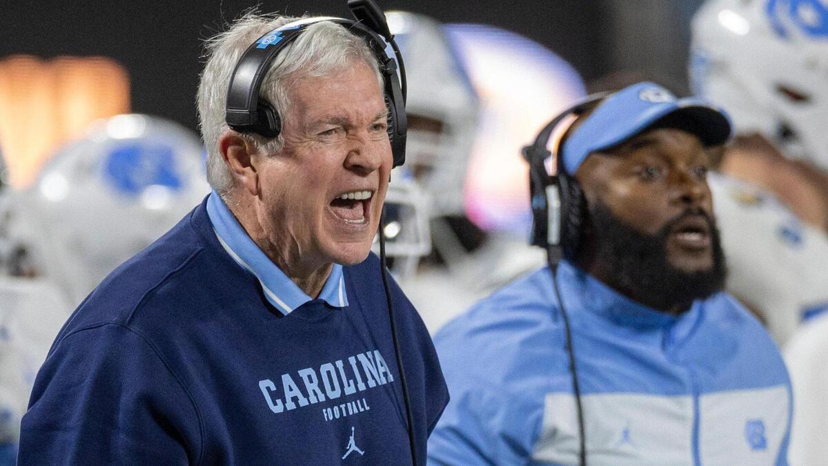 North Carolina coach Mack Brown yells at his defensive unit in the fourth quarter against West Virginia in the Duke’s Mayo Bowl on Wednesday, December 27, 2023 at Bank of American Stadium in Charlotte, N.C.