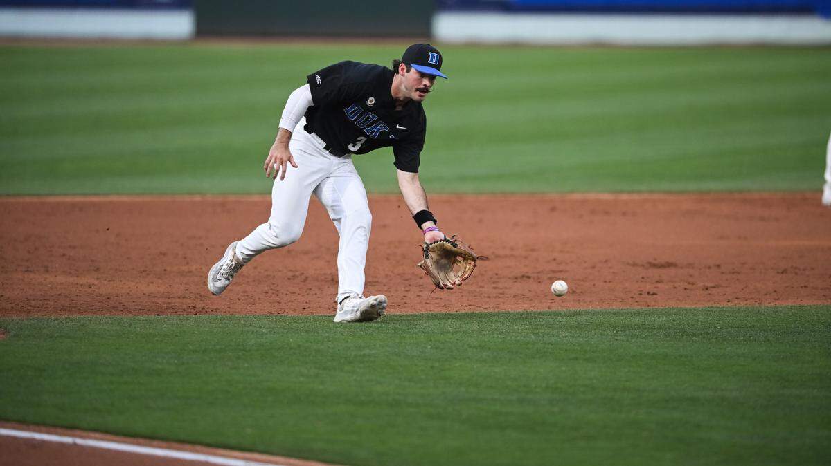 Duke third baseman Ben Miller fields a ground ball during an ACC baseball tournament semifinal game against Miami Saturday night at Truist Field in Charlotte.