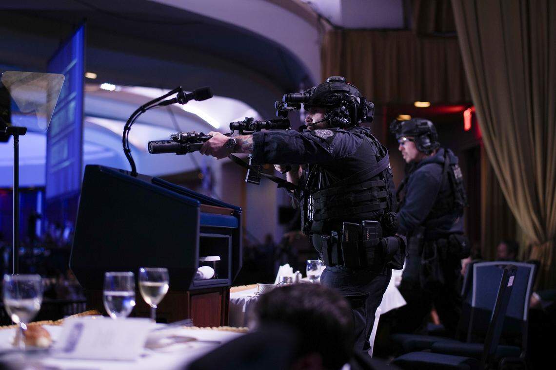 Agents stand guard after an incident at the annual White House Correspondents Association Dinner April 25, 2026 in Washington, DC. According to reports, President Donald Trump, along with other government officials, were evacuated from the Washington Hilton after what sounded like gun fire. 