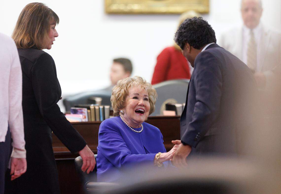 Former U.S. Sen. Elizabeth Dole smiles as she greets people prior to a special ceremony in the Senate chamber of the Legislative Building on Wednesday, June 4, 2025, in Raleigh, N.C.