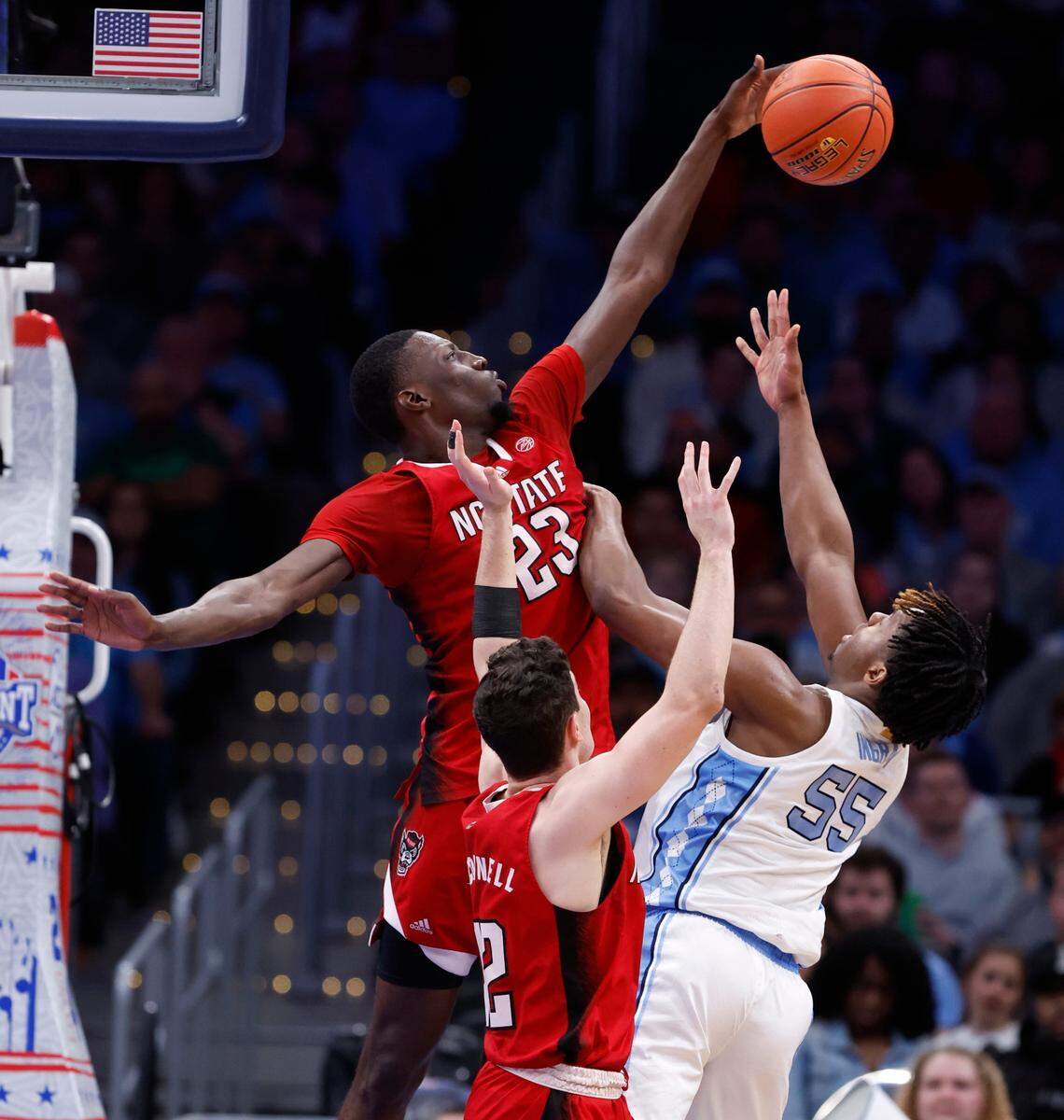 N.C. State’s Mohamed Diarra (23) blocks the shot by North Carolina’s Harrison Ingram (55) during the second half N.C. State’s 84-76 victory over UNC in the championship game of the 2024 ACC Men’s Basketball Tournament at Capital One Arena in Washington, D.C., Saturday, March 16, 2024.