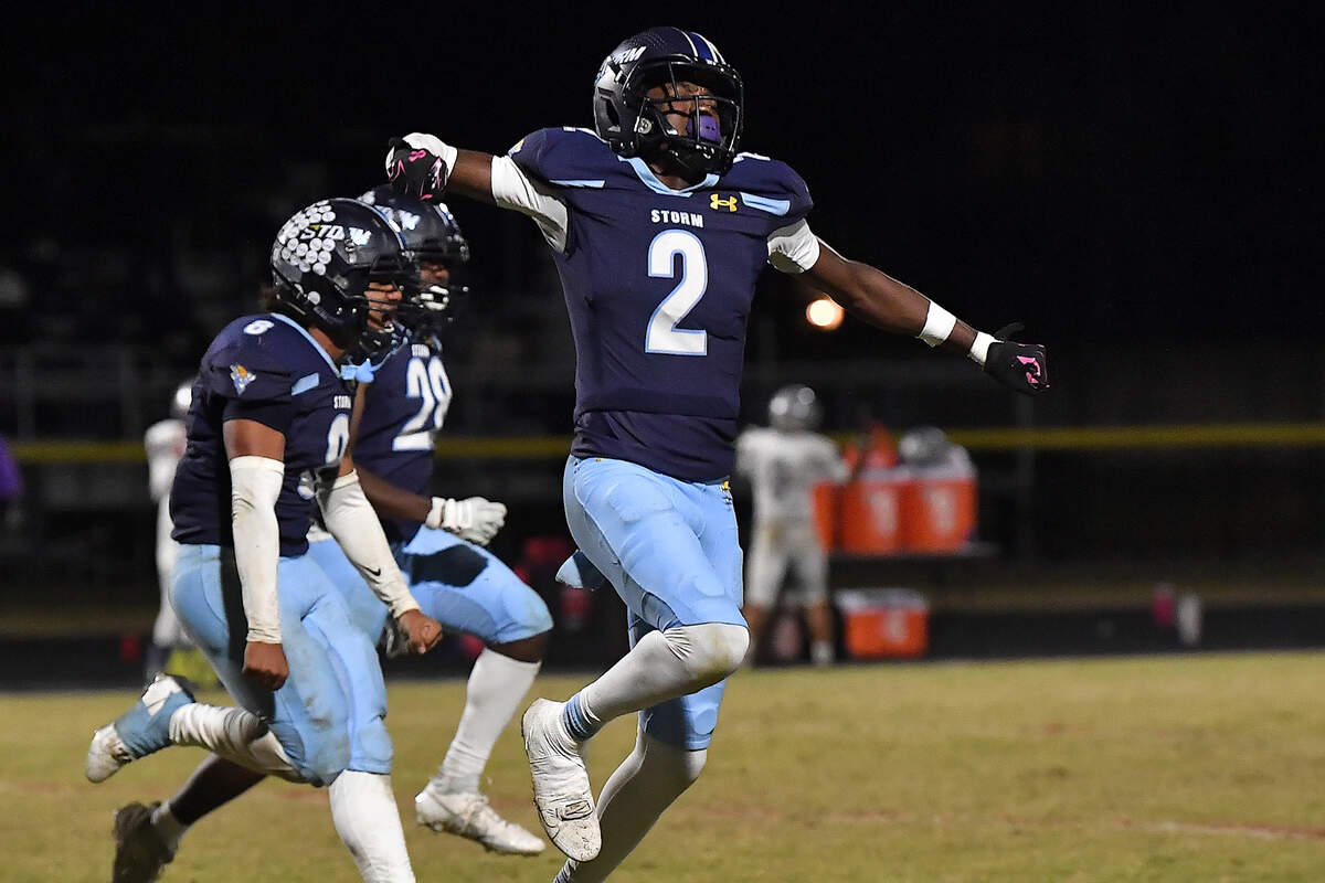Willow Spring cornerback Kei’marius Hollie (2) and teammates celebrates after South garner’s first missed field goal late in the fourth quarter. The Willow Spring Storm and the South Garner Titans met in a football game in Fuquay-Varina. N.C. on October 18, 2024.