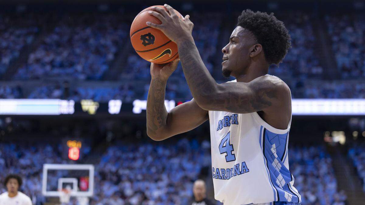 North Carolina guard Jaydon Young (4) lines up a three-point shot in the second half against Wake Forest on Saturday, January 10, 2026 at the Smith Center in Chapel Hill, N.C. Young was 3 of 5 from the three point line, scoring 12 points in the Tar Heels’ victory.