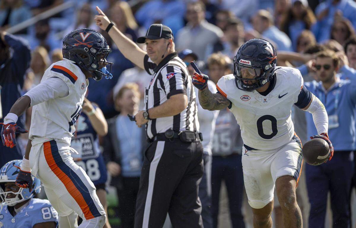 Virginia safety Antonio Clary (0) reacts after intercepting the ball forcing overtime on the Tar Heels’ final play of the fourth quarter on Saturday, October 25, 2025 at Kenan Stadium in Chapel Hill, N.C.    