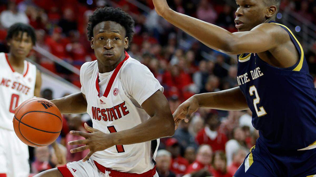 North Carolina State’s Jarkel Joiner drives past Notre Dame’s Ven-Allen Lubin during the second half of a men’s basketball game at PNC Arena on Tuesday, Jan. 24, 2023, in Raleigh, N.C.