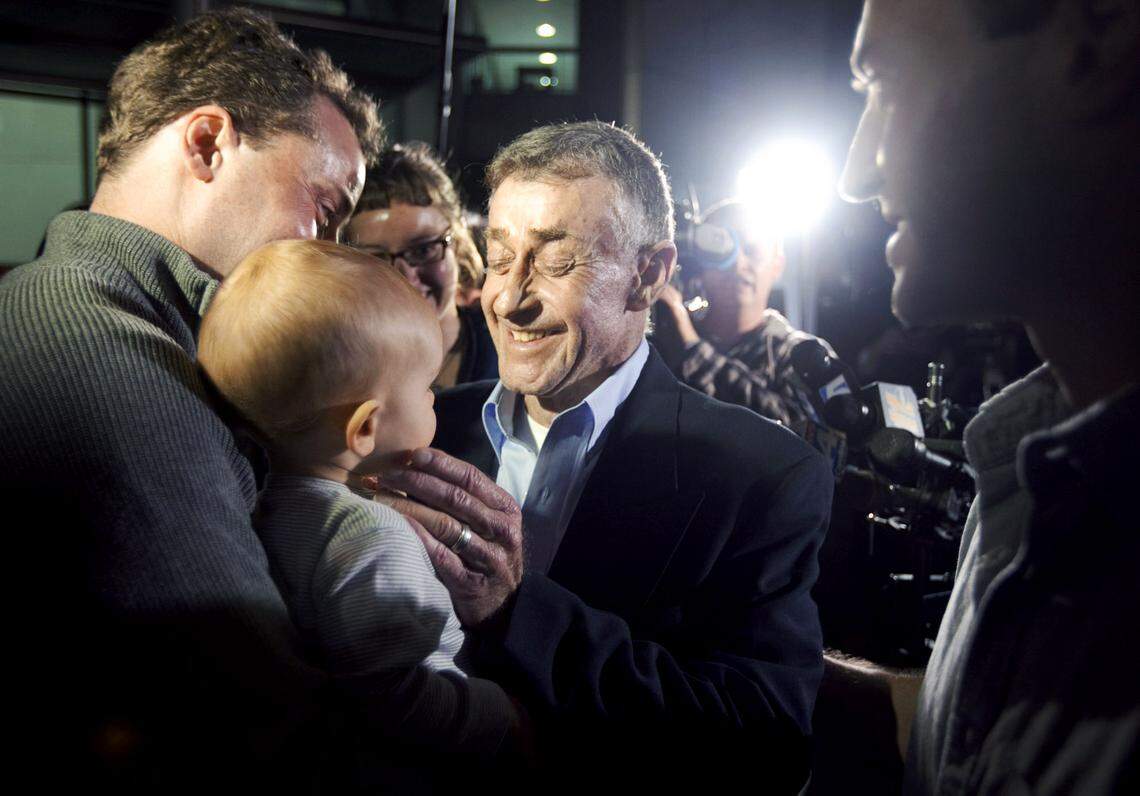 Michael Peterson holds his 12-month-old grandson Dorian after leaving the Durham County Jail on Thursday, December 15, 2011. Peterson was granted a new trial by Judge Orlando Hudson the day before when Hudson determined that former SBI agent Duane Deaver misled the judge and jury in 2003 with his testimony which helped convict Peterson in the death of his wife, Kathleen Peterson.