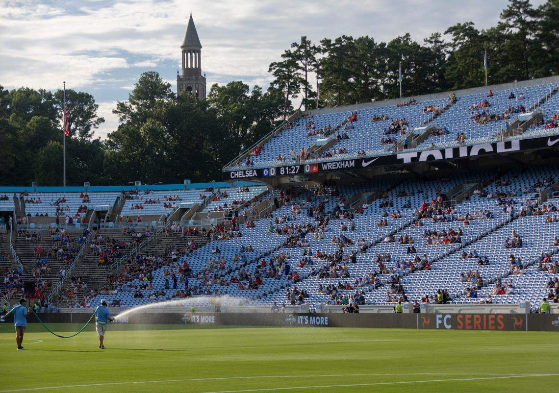 The University of North Carolina Turf Management team waters the field prior to the FC Series game between Chelsea and Wrexham on Wednesday, July 19, 2023 in Kenan Stadium inn Chapel Hill, N.C.