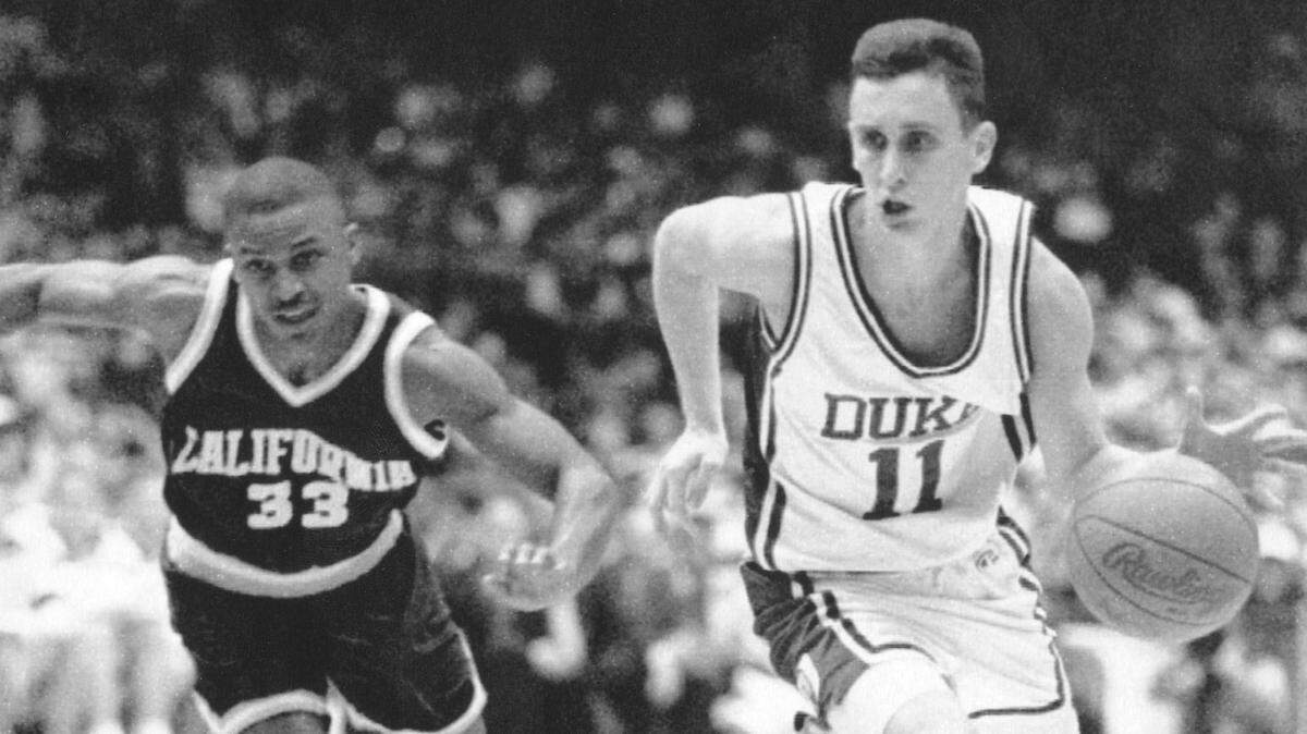 Duke’s Bobby Hurley attempts to elude Cal’s Akili Jones in a 1993 game.