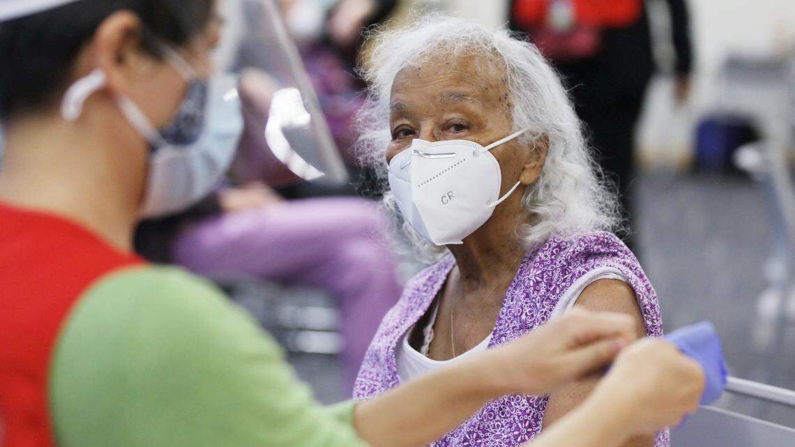 Fledra Hatch awaits her Moderna COVID-19 vaccine at the Durham County Department of Public Health in Durham, N.C. on Friday, January 8, 2021.