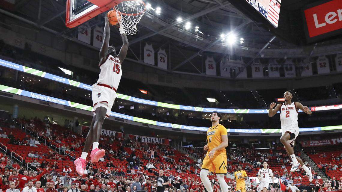 N.C. State’s Jerry Deng slams in two during the second half of the Wolfpack’s 110-64 win over UNC Greensboro on Nov. 12, 2025, at the Lenovo Center in Raleigh.