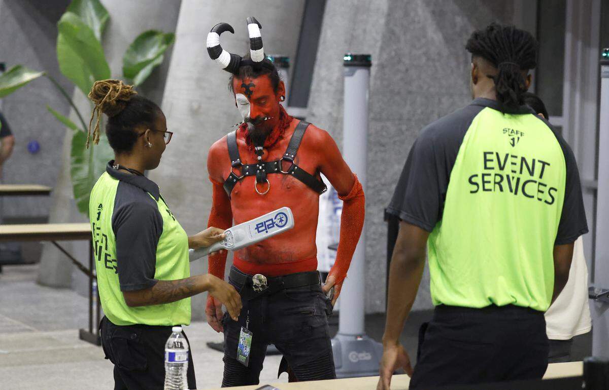Josh Ayala, cosplaying Biltzo from Helluva Boss, is wanded as he enters GalaxyCon Raleigh at the Raleigh Convention Center Friday, July 25, 2025.