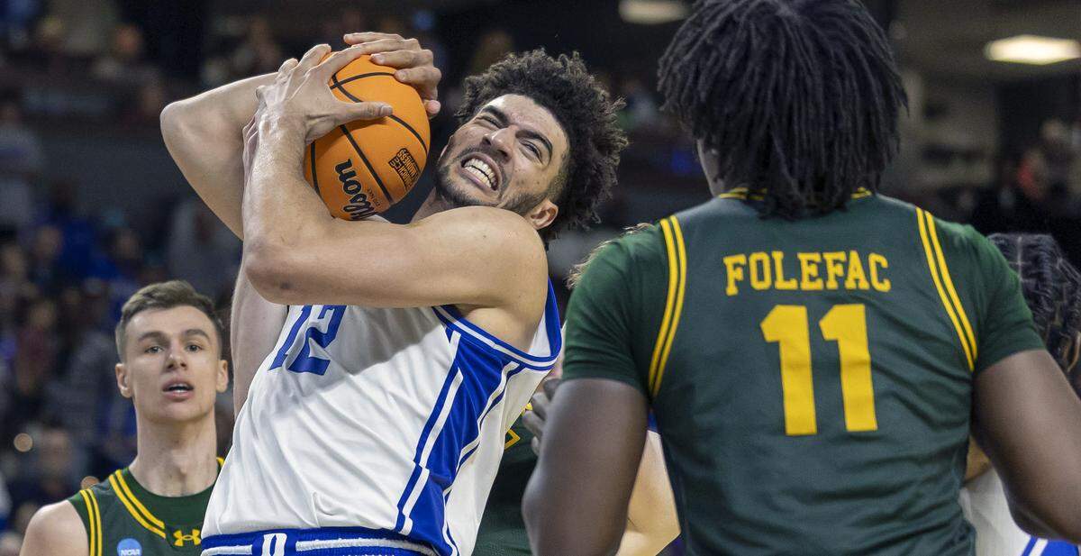 Duke forward Cameron Boozer (12) harnesses a defensive rebound in the second half against Siena on Thursday, March 18, 2026, during the first round of the NCAA Tournament at Bon Secours Arena in Greenville, S.C.