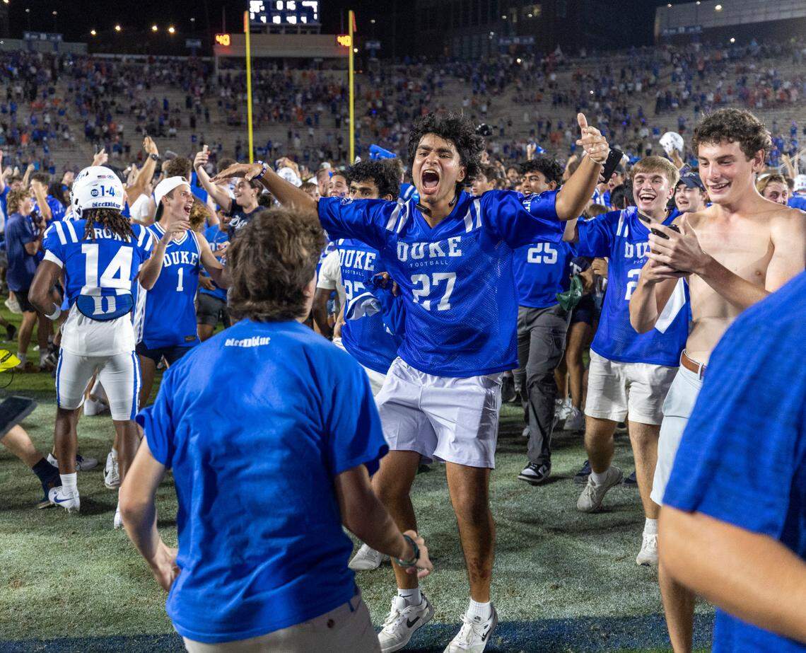 Duke fans storm the field to celebrate their 28-7 victory over Clemson on Monday, September 4, 2023 at Wallace Wade Stadium Stadium in Durham, N.C.
