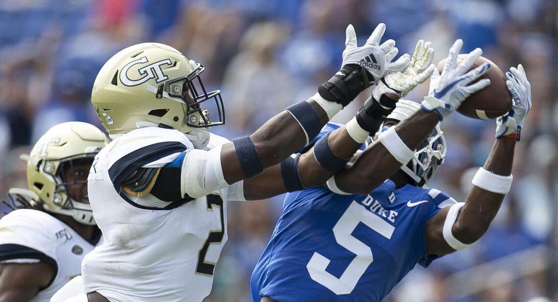 Duke’s Jalon Calhoun (5) pulls in a 42-yard pass from quarterback Quentin Harris (18) ahead of Georgia Tech’s Tariq Carpenter (2) in the first quarter on Saturday October 12, 2019 at Wallace Wade Stadium in Durham, N.C.