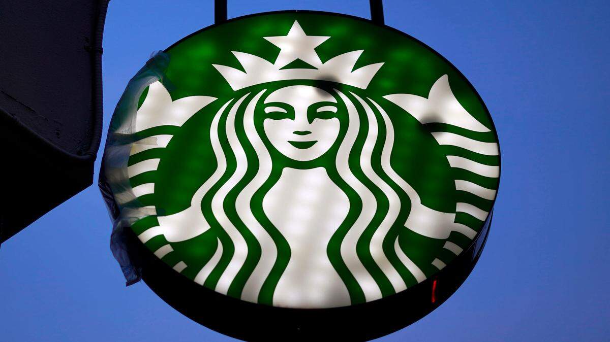 This is the Starbucks logo on a sign outside a downtown Pittsburgh Starbucks, Wednesday, Jan. 12, 2022.