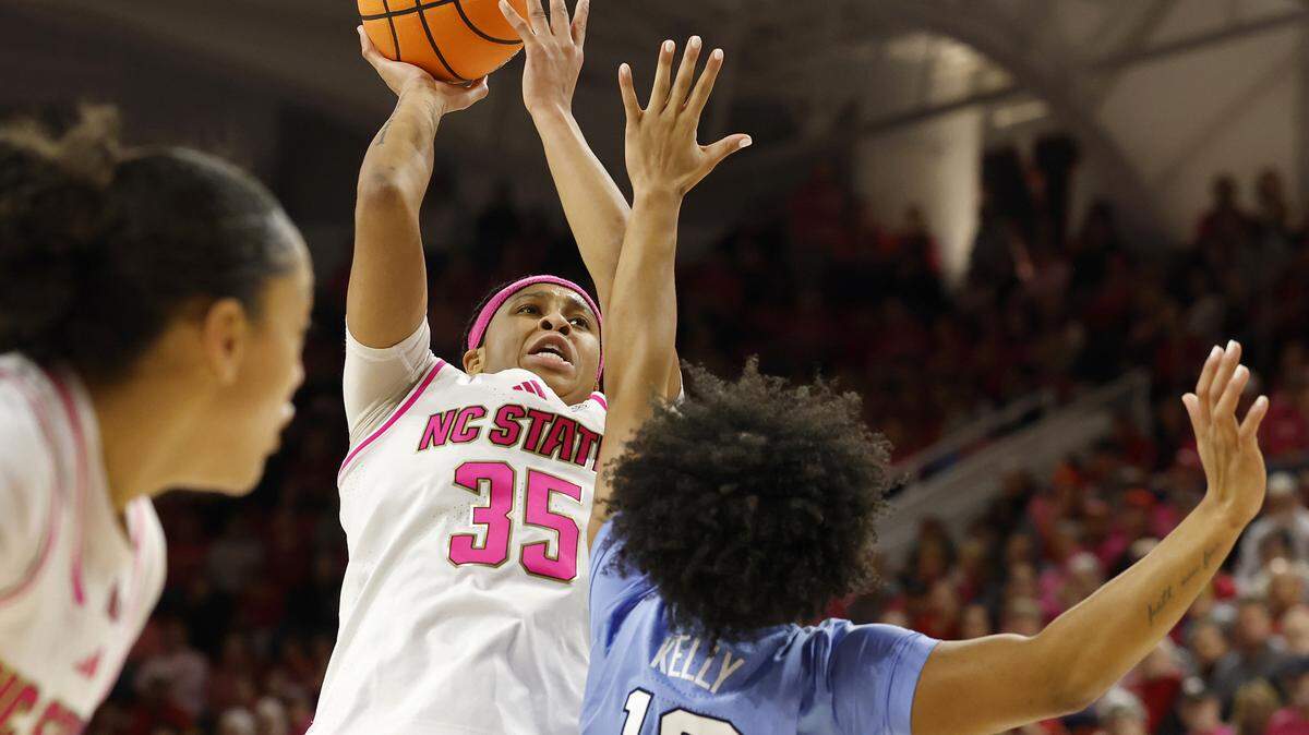 N.C. State’s Zoe Brooks shoots over North Carolina’s Reniya Kelly during the second half of the Wolfpack’s 61-59 loss on Monday, Feb. 2, 2026, at Reynolds Coliseum in Raleigh, N.C.