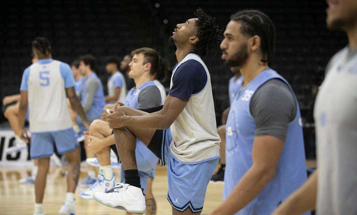 North Carolinas Leaky Black (1) checks out his surrounding as he stretches with teammates during the Tar Heels open practice on Thursday, March 24, 2022 at Wells Fargo Center in Philadelphia, Pa.