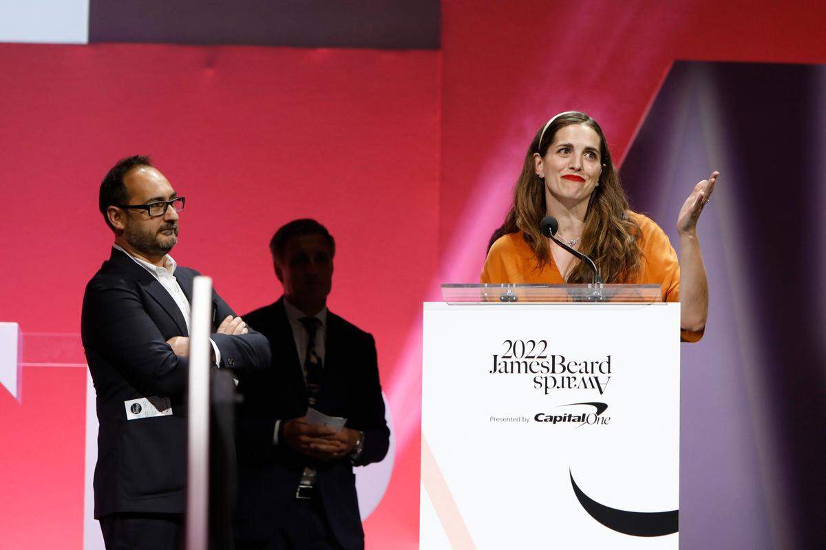Cúrate owners Félix Meana and owner-chef Katie Button accept the James Beard Award for Outstanding Hospitality during the 2022 James Beard Restaurant and Chef Awards at Lyric Opera of Chicago on June 13, 2022 in Chicago, Illinois.