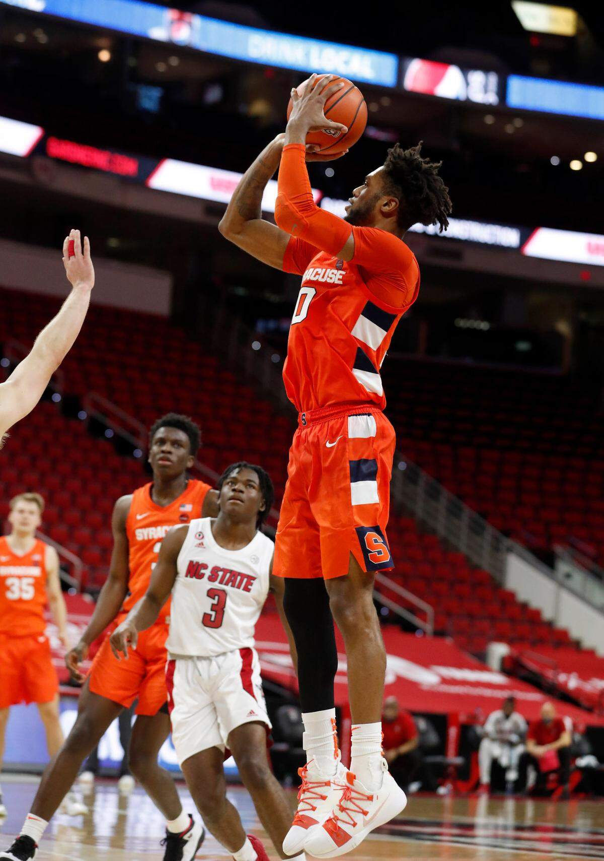 Syracuse’s Alan Griffin (0) shoots during the second half of Syracuse’s 77-68 victory over N.C. State at PNC Arena in Raleigh, N.C., Tuesday, February 9, 2021.
