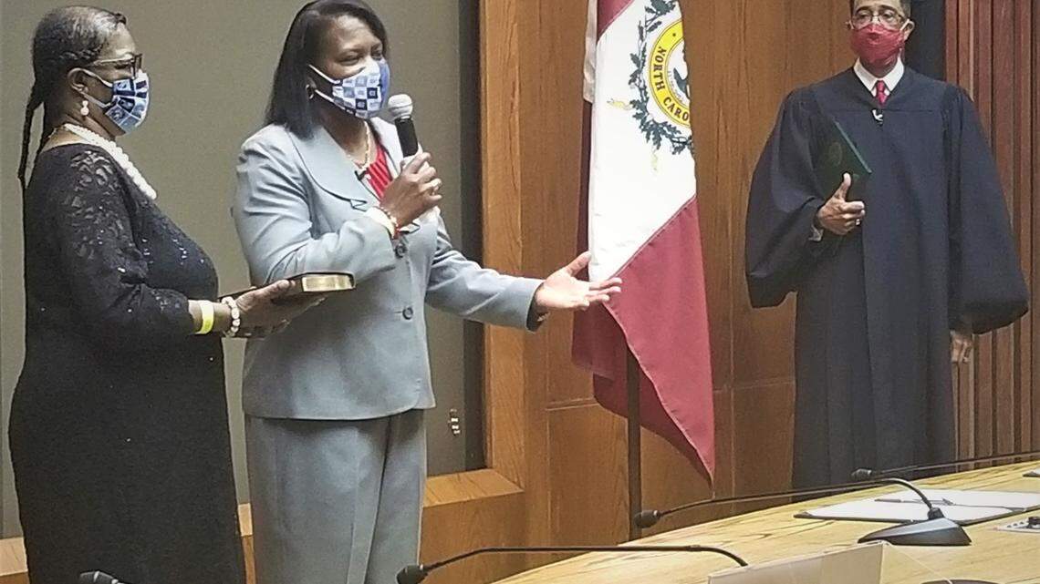 Stormie Forte, Raleigh’s newest City Council member, takes the oath of office Tuesday, July 21, 2020, with her mother, Frances Forte Hinton, beside her and N.C. Supreme Court Judge Michael Morgan looking on.