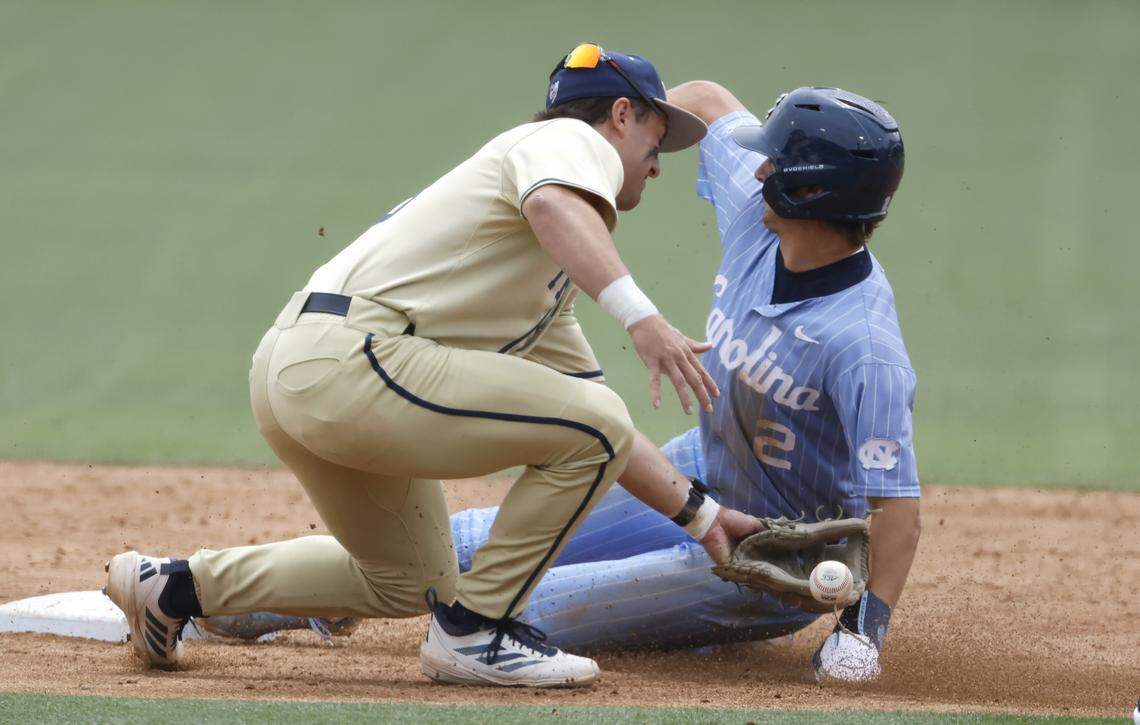 North Carolina's Jake Schaffner (2) beats the throw to Georgia Tech's Carson Kerce (3) to steal second base in the third inning during Georgia Tech’s 5-2 victory over UNC at Boshamer Stadium in Chapel Hill, N.C., Sunday, April 19, 2026.