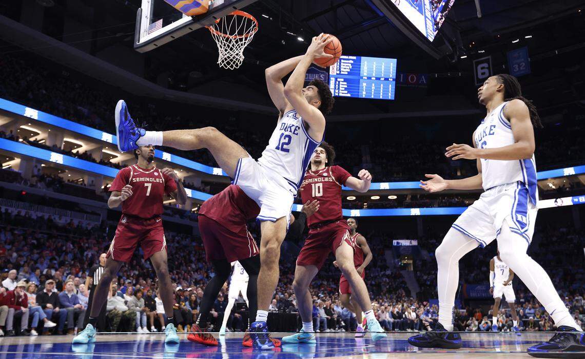 Duke’s Cameron Boozer (12) pulls in the rebound during Duke’s 80-79 victory over Florida State in the quarterfinals of the 2026 ACC Men’s Basketball Tournament at the Spectrum Center in Charlotte, N.C., Thursday, March 12, 2026.