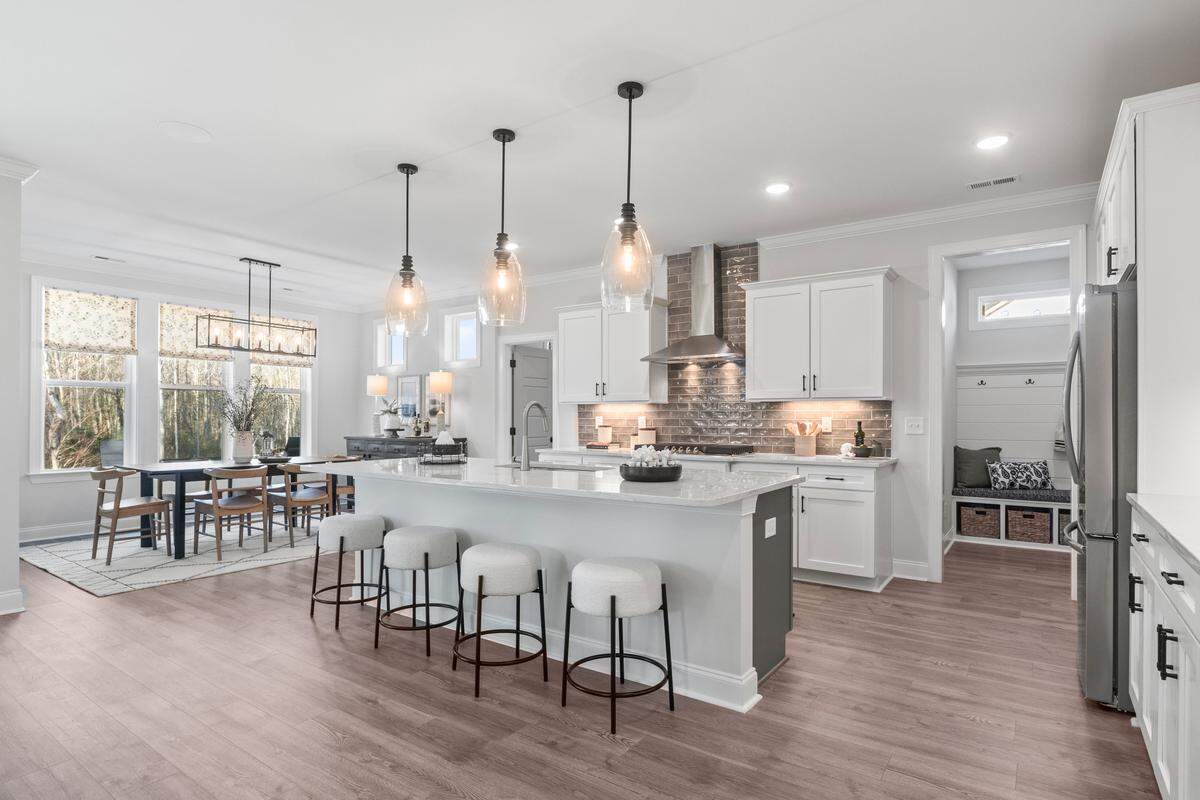 A rendering of a “chef’s kitchen” inside a new luxury “infill” community in North Raleigh.