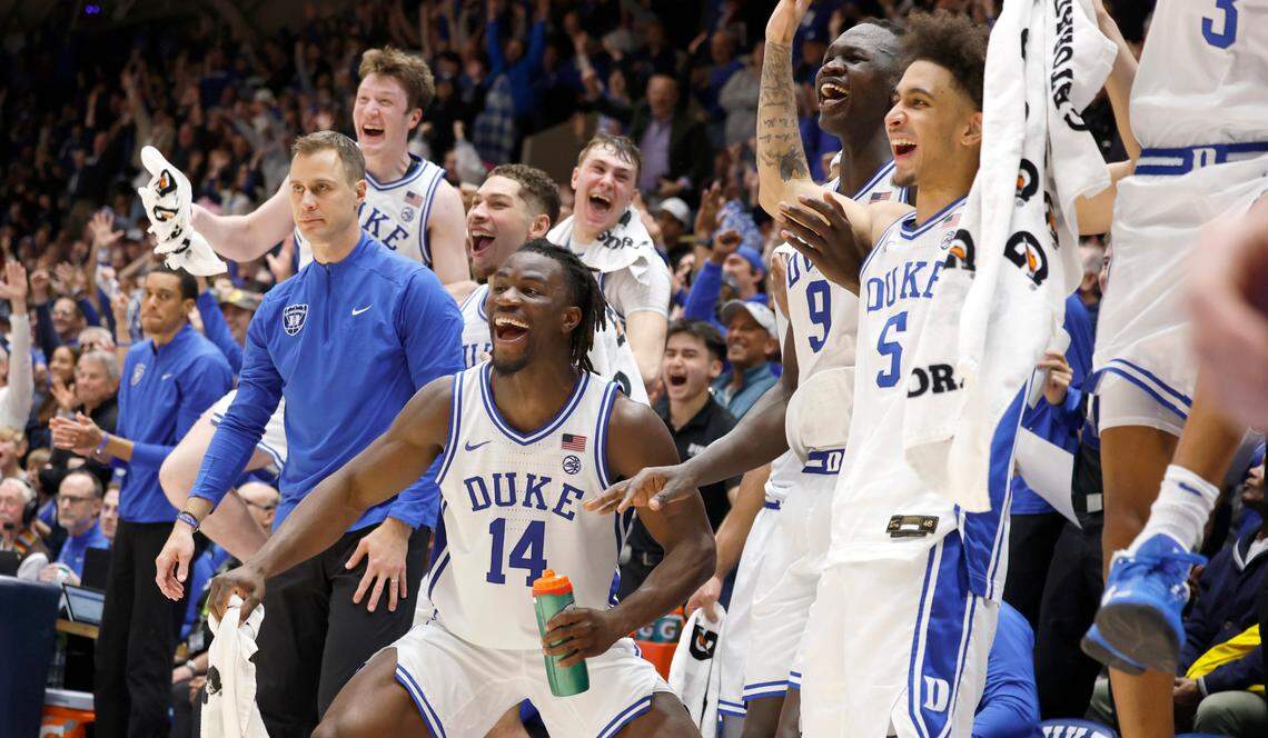 From left, Duke’s Kon Knueppel (7), Mason Gillis (18), Sion James (14), Cooper Flagg (2), Khaman Maluach (9) and Tyrese Proctor (5) celebrate after Neal Begovich slammed in two in the final seconds of Duke’s 106-70 victory over Stanford at Cameron Indoor Stadium in Durham, N.C., Saturday, Feb. 15, 2025.