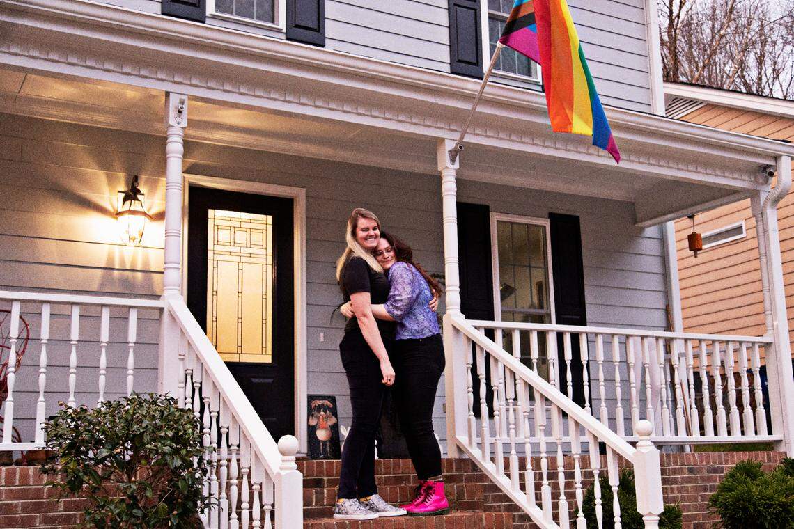 From left, Erica Rogers and Azul Zapata at their home in Raleigh on Friday, Jan. 28. 2022. Rogers, who is Canadian, and Zapata, who is Argentinian, recently bought their first home and plan to wed on Feb. 4, 2022.