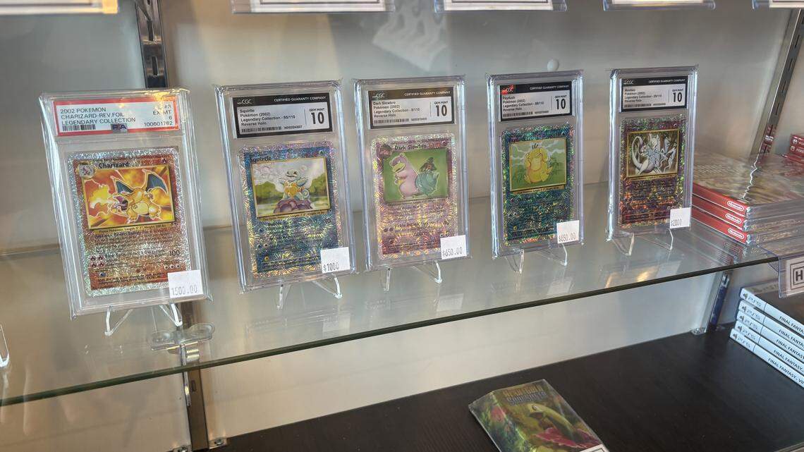 A row of the highest-priced Pokémon cards at Raleigh's Hidden Block Games on Feb. 26, 2025.