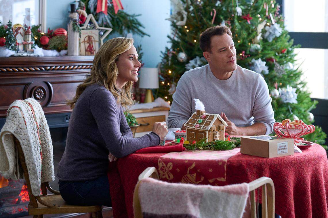 Nikki DeLoach (left) and David Haydn-Jones in “Five More Minutes.” A woman’s Christmas wish is answered in unexpected ways when her late grandfather’s journal turns up and reveals an untold romance in the Hallmark Movies & Mysteries film based on a Scotty McCreery song.