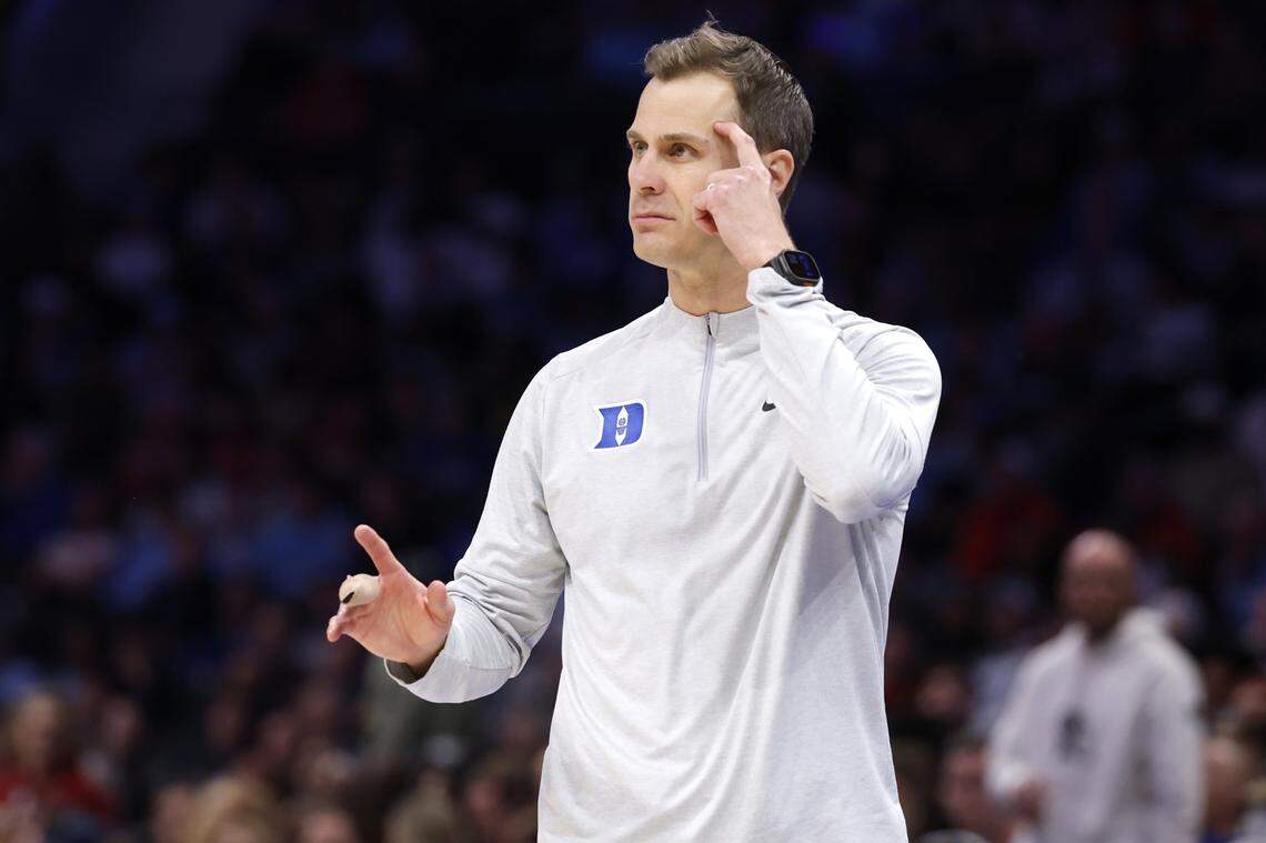 Duke head coach Jon Scheyer motions to his players in the second half of DukeÕs 80-79 victory over Florida State in the quarterfinals of the 2026 ACC MenÕs Basketball Tournament at the Spectrum Center in Charlotte, N.C., Thursday, March 12, 2026.