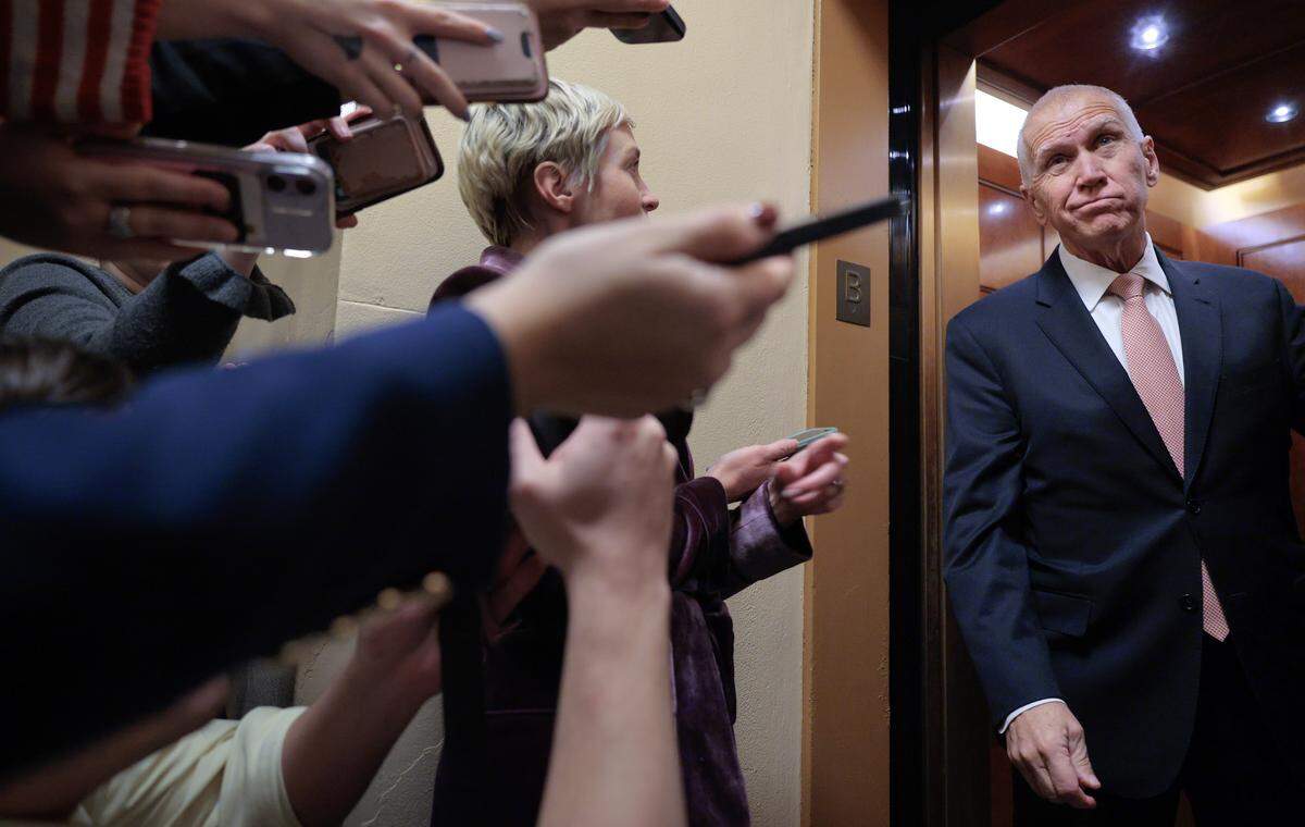 Sen. Thom Tillis talks with reporters as he heads for a federal government funding vote at the U.S. Capitol on January 29, 2026 in Washington, DC. Eight Republicans joined every Senate Democrat to block the sweeping federal government funding legislation 55-45, setting up another vote to prevent a partial shutdown at midnight Friday. 