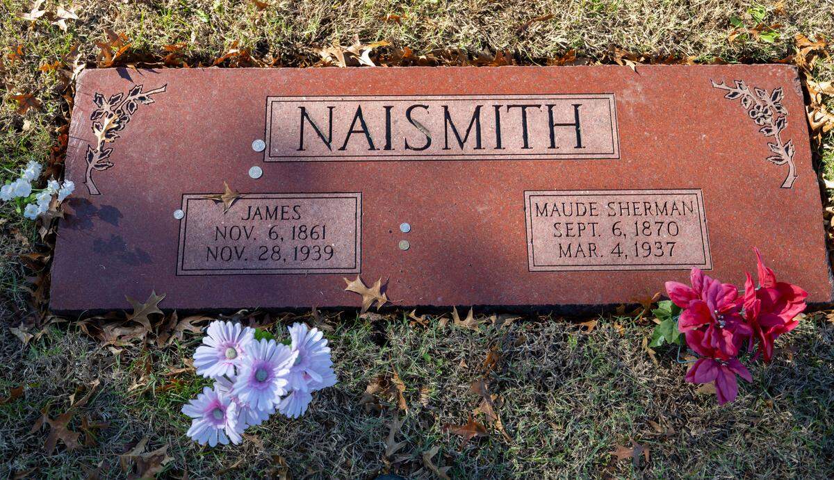 A grave of James Naismith at Memorial Park Cemetery, the inventor of the game of basketball and the first coach at Kansas, photographed on Thursday, November 7, 2024 in Lawrence, Kansas.