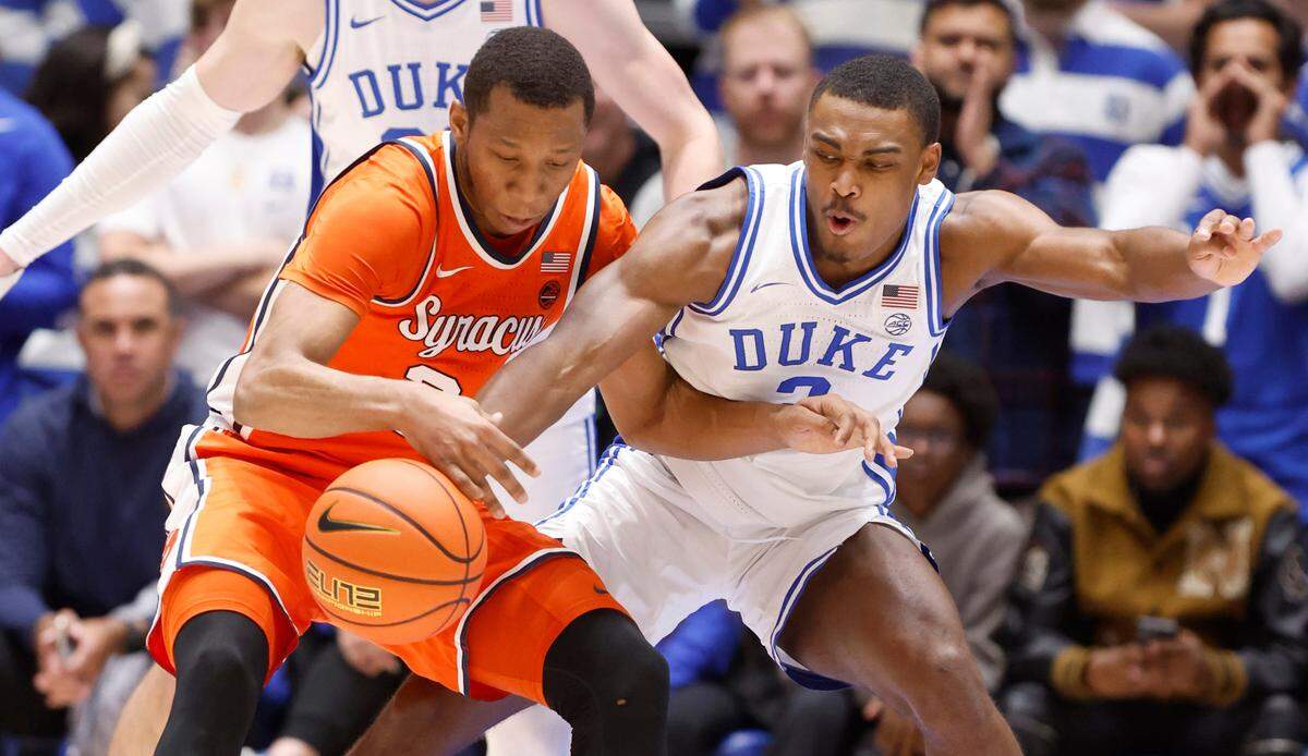 Duke’s Jaylen Blakes (2) knocks the ball from Syracuse’s Quadir Copeland (24) during the second half of Duke’s 86-66 victory over Syracuse at Cameron Indoor Stadium in Durham, N.C., Tuesday, Jan. 2, 2024.