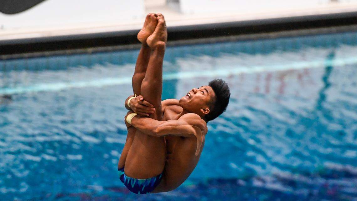 Father of Triangle-raised Olympian must watch son compete from home, again