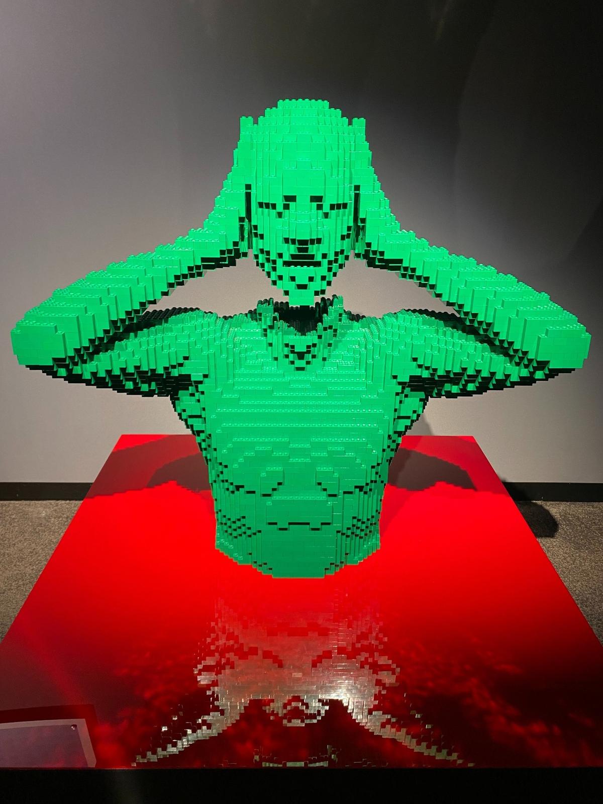 “Green” by Nathan Sawaya, made entirely of Legos, now on view in a Raleigh gallery