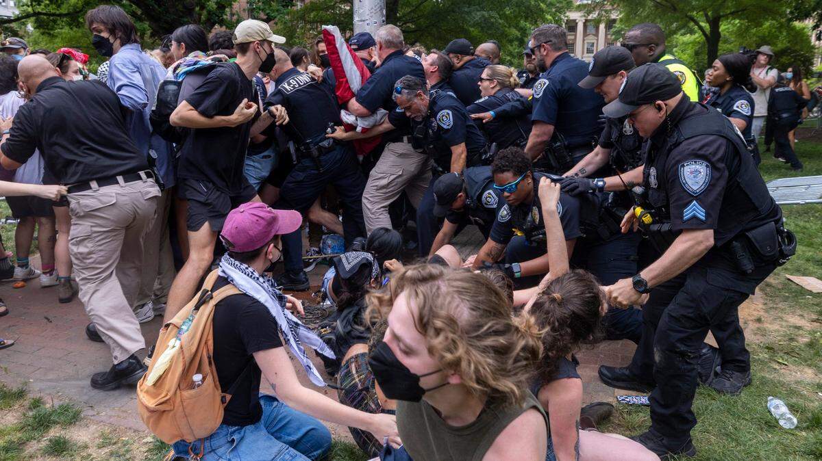 Photos: Dozens of ‘Gaza solidarity’ protesters detained at UNC tent encampment; battle for US flag on campus