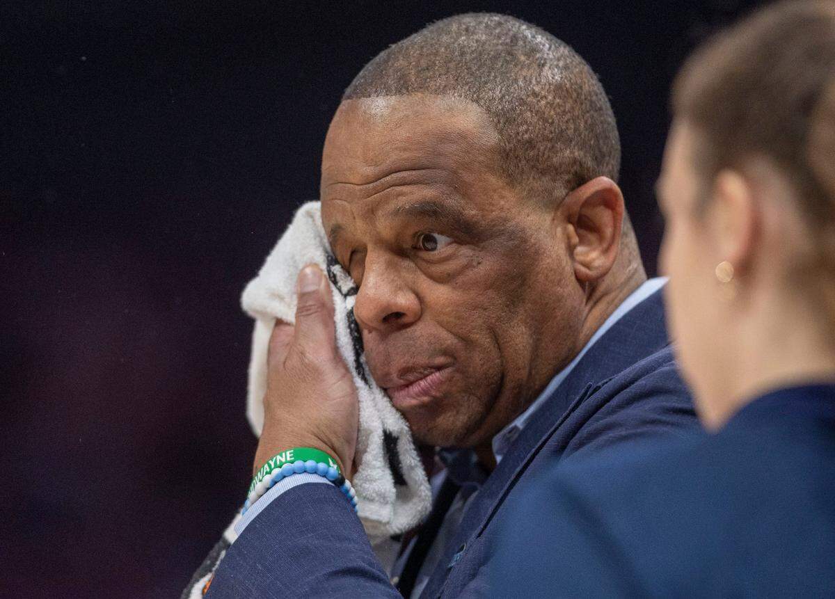 North Carolina coach Hubert Davis wipes his brow following a time-out in the first half against Wake Forest on Thursday, March 13, 2025 during the quarterfinals of the ACC Tournament at Spectrum Center in Charlotte, N.C.