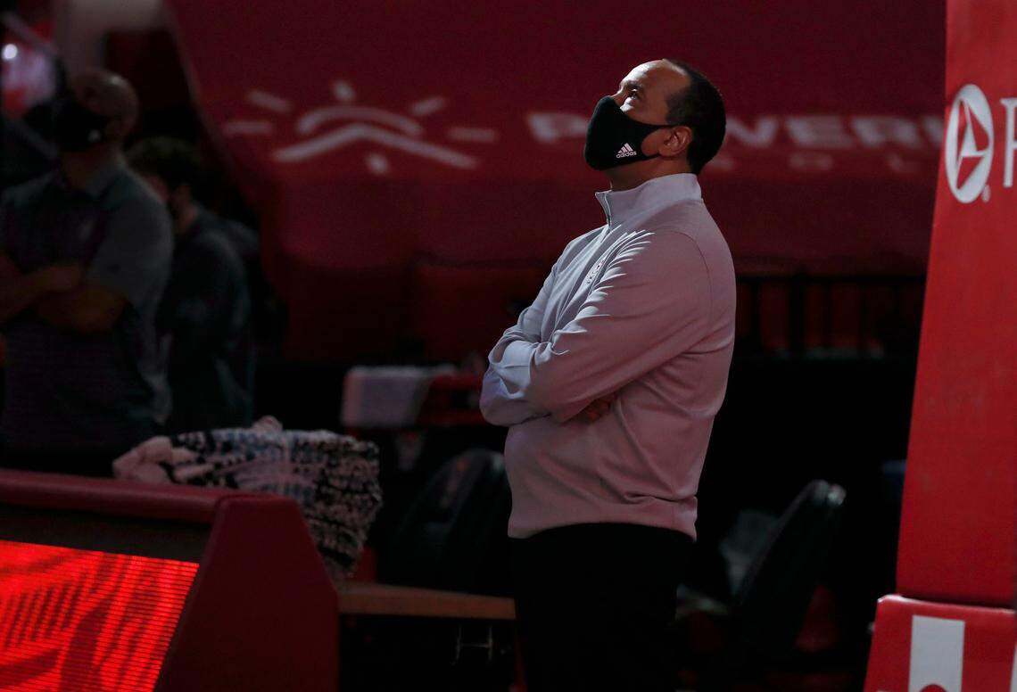 N.C. State head coach Kevin Keatts watches the introductory video before N.C. State’s game against Boston College at PNC Arena in Raleigh, N.C., Wednesday, December 30, 2020.