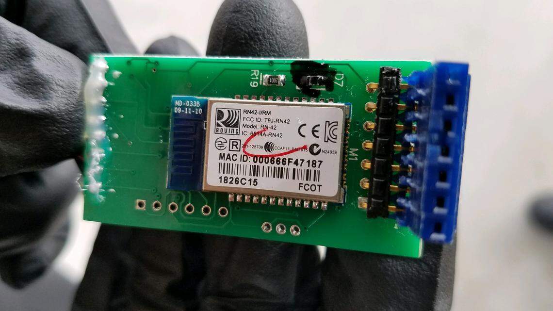 A skimmer device that criminals install inside a gas pump to illegally collect customers’ debit card information.