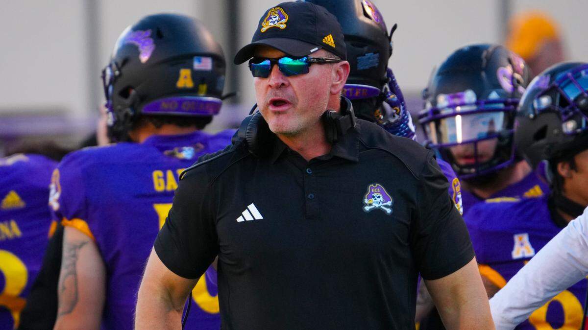 Nov 4, 2023; Greenville, North Carolina, USA; East Carolina Pirates head coach Mike Houston looks on against the Tulane Green Wave during the first half at Dowdy-Ficklen Stadium.