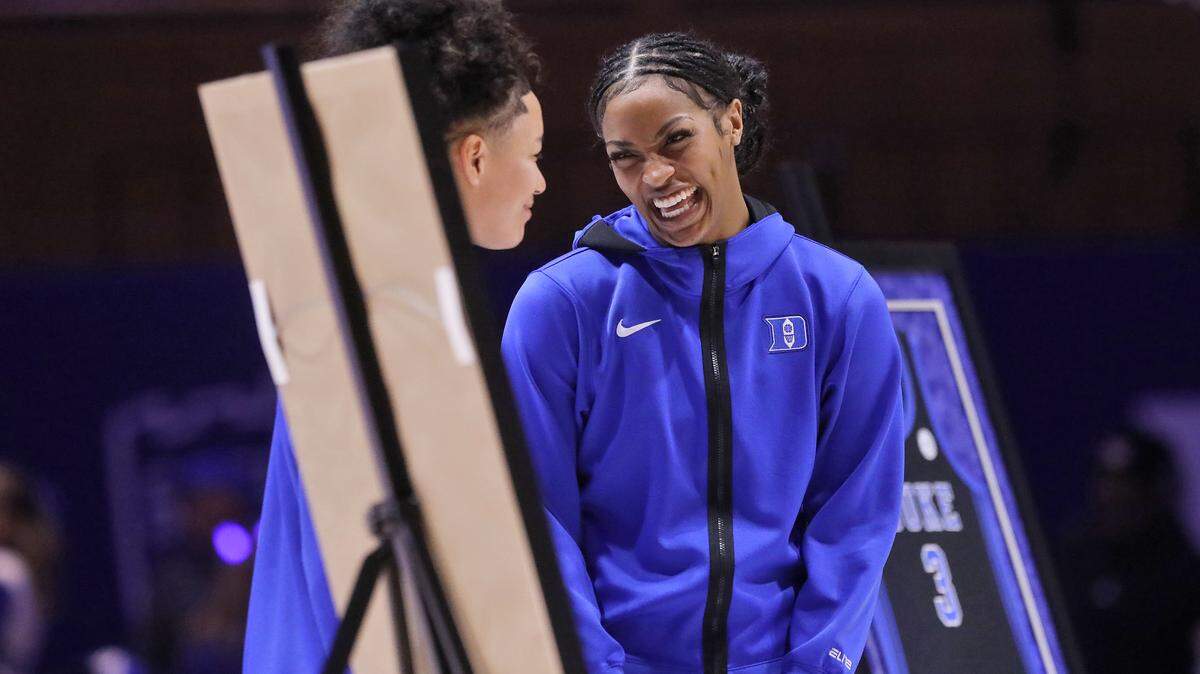 Duke’s Taina Mair and Ashlon Jackson smile during a senior day ceremony prior to the Blue Devils’ game against North Carolina on Sunday, Feb. 15, 2026, at Cameron Indoor Stadium in Durham, N.C.