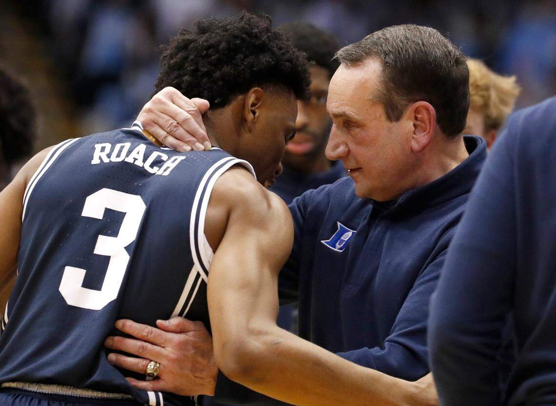 Duke head coach Mike Krzyzewski talks with Jeremy Roach (3) during the second half of Dukeís 87-67 victory over UNC at the Smith Center in Chapel Hill, N.C., Saturday, Feb. 5, 2022.