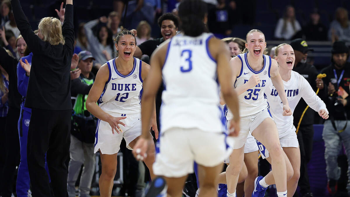 The Duke Blue Devils react as they defeat the Louisville Cardinals during overtime to win the Women's ACC Championship at Gas South Arena on March 8, 2026 in Duluth, Georgia.