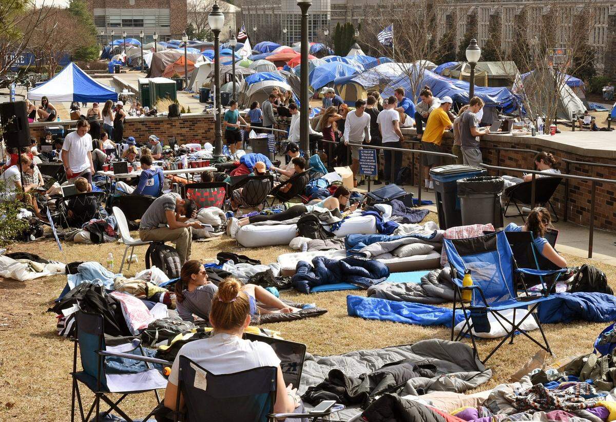 Duke students wait in line outside Cameron Indoor Stadium on the campus of Duke University in Durham, N.C., Tuesday, Feb. 7, 2017 waiting on the rivalry game with UNC this coming Thursday night. The tents of “Krzyzewskiville” as several hundred students wait to see if spots open up after the tenters get inside. Students in line usually spend several nights outside in sleeping bags and blankets to get into the UNC game.