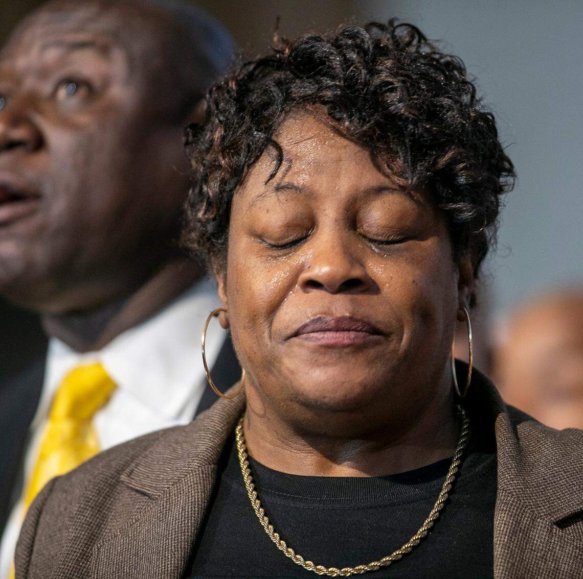 Sonya Williams, the mother of Darryl Williams, weeps while civil rights attorney Ben Crump speaks during a press briefing on Thursday, February 16. 2023 at Mount Peace Baptist Church in Raleigh, N.C. Williams was tased by Raleigh police in January. Crump has been retained by the Williams family, calling for the officers involved to be charged with manslaughter.