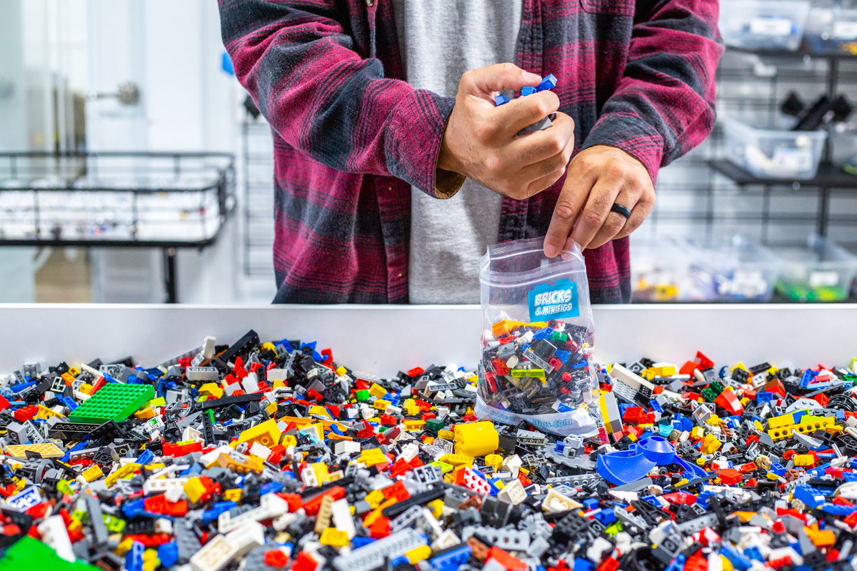 A former Wells Fargo banker is accused of fencing “highly lucrative” LEGO products stolen from Walmart and Target stores in the Charlotte area, investigators said.