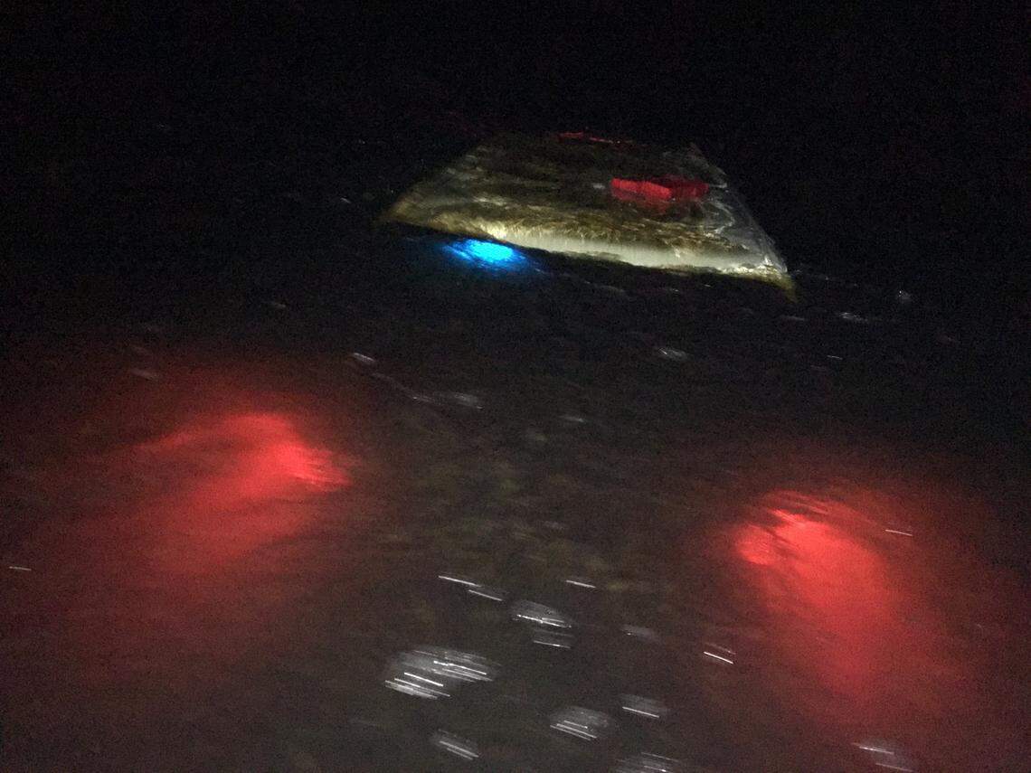 Rescuers were not able to cut through the the top of the cage. A team of divers recovered the bodies the next day.