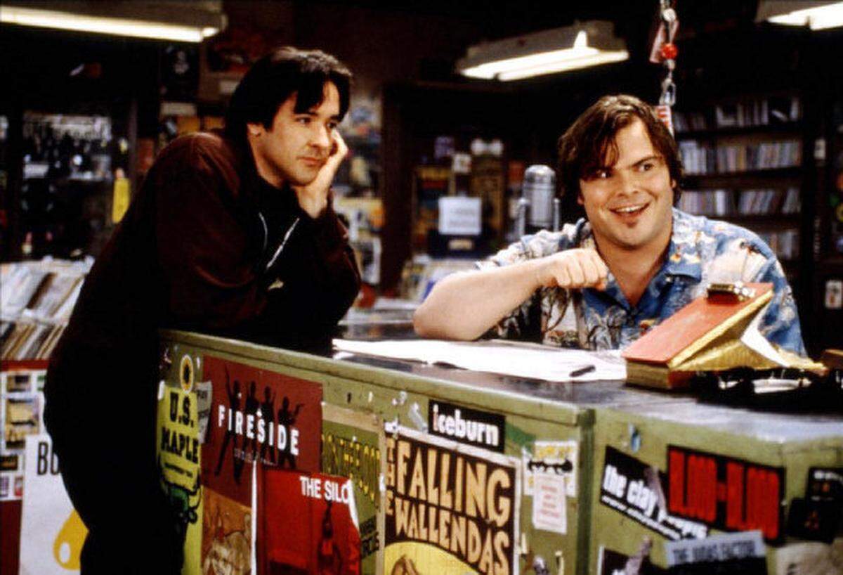 From left, John Cusack and Jack Black in “High Fidelity.” The movie shows in Raleigh for one night only on April 20. Cusack will answer questions after the film.